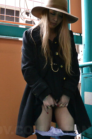 Yui Nagahara with long, blonde hair sucks cocks and rubs her pussy.
