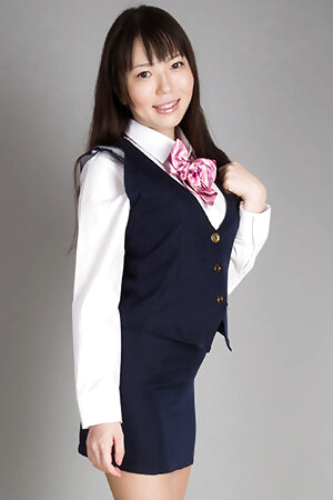 Yuma Miyazaki posing in a uniform and teasing her pussy with a vibrator