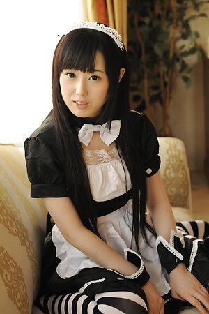 Naughty maid Machiko Ono shows her shaved pussy