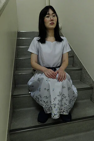 Cute Mami Tokita moves her panties to show her hairy pussy